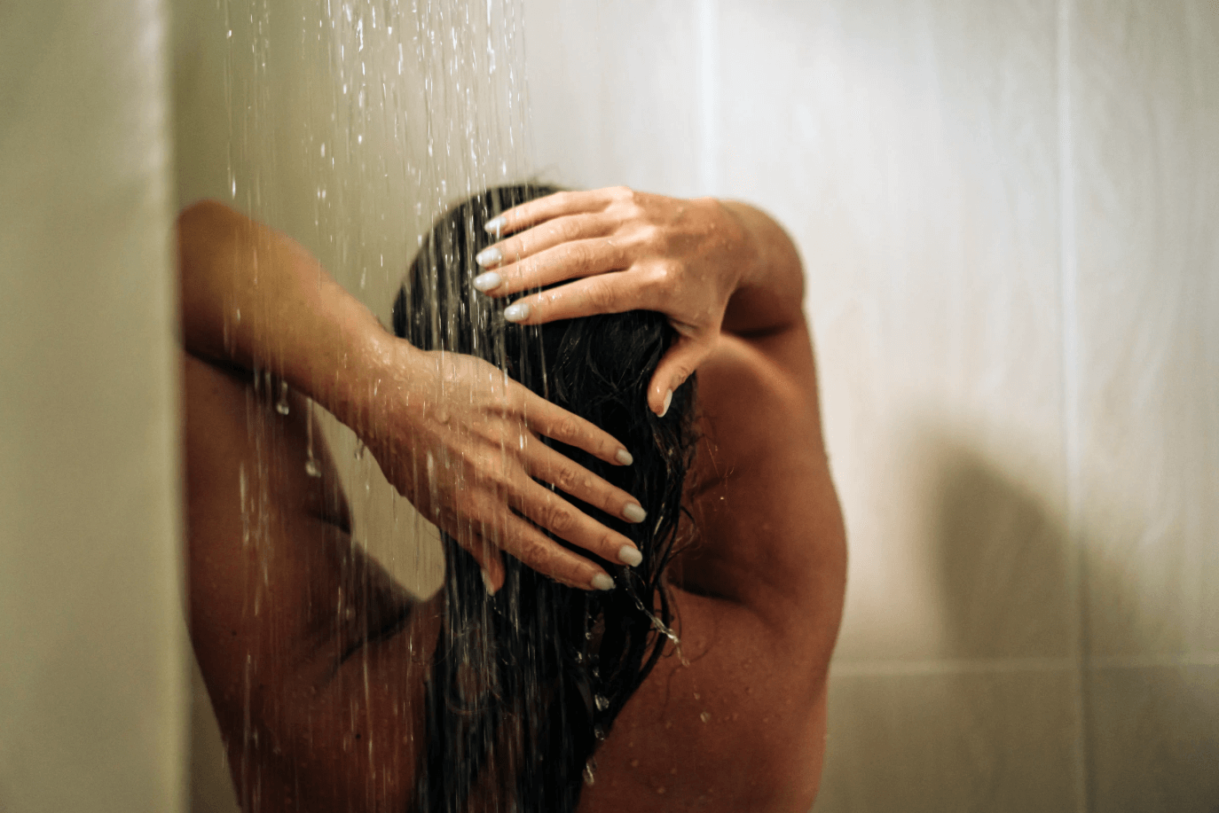 Yahoo - Gen Z-ers spend the longest time in the shower - Jinmeng Zhang, MD, FAAD