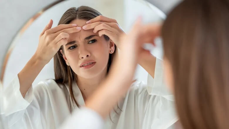 Glam - Have Annoying Forehead Acne Here's What May Be Causing It - Dr. Jay Wofford MD FAAD